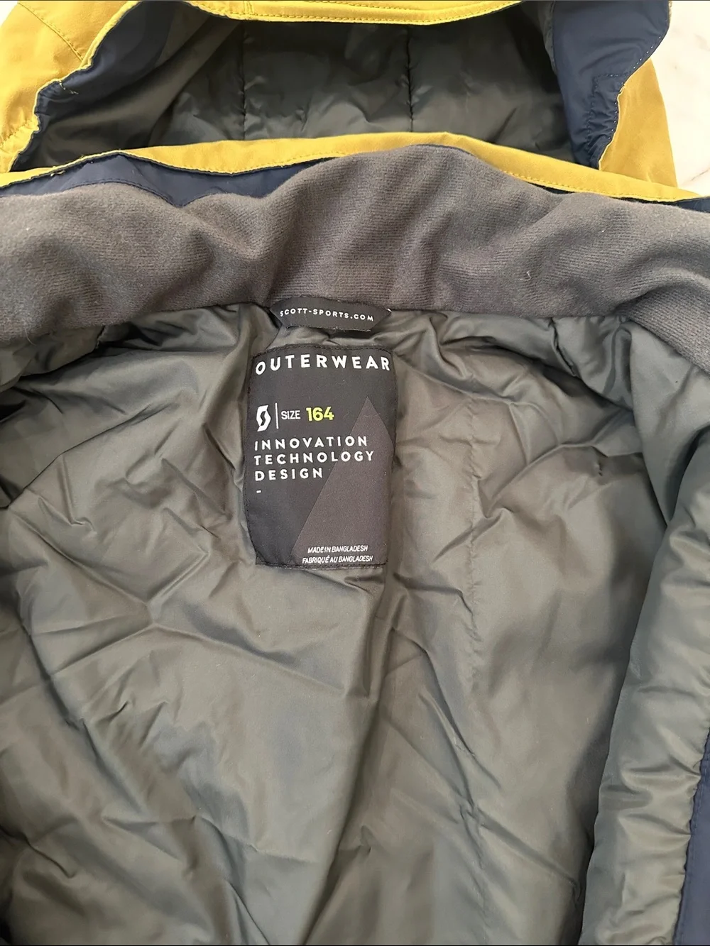 Scott Hooded Kids Ski Jacket in Mustard with Navy Accents